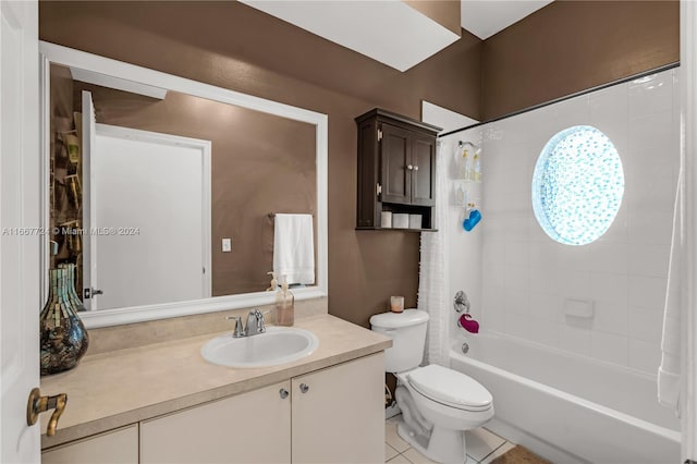 full bathroom with shower / tub combo with curtain, vanity, toilet, and tile patterned flooring