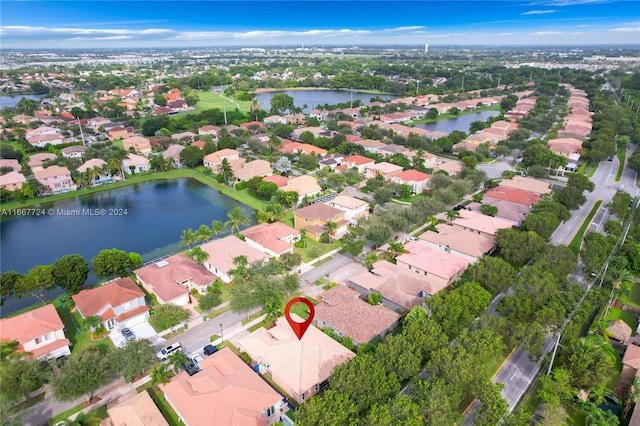 drone / aerial view featuring a water view