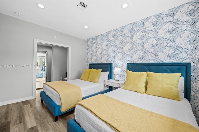 bedroom featuring hardwood / wood-style floors