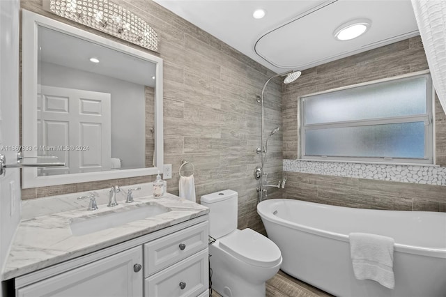 full bathroom featuring tile walls and toilet