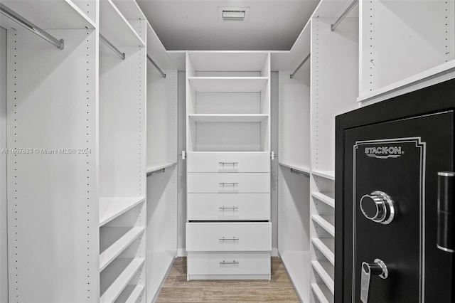 spacious closet with light wood-type flooring