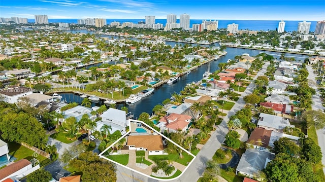 birds eye view of property featuring a water view