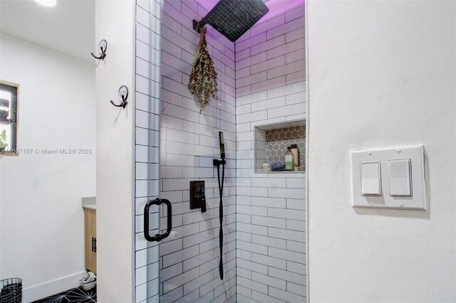 bathroom with vanity, toilet, tile patterned floors, and a shower with shower door