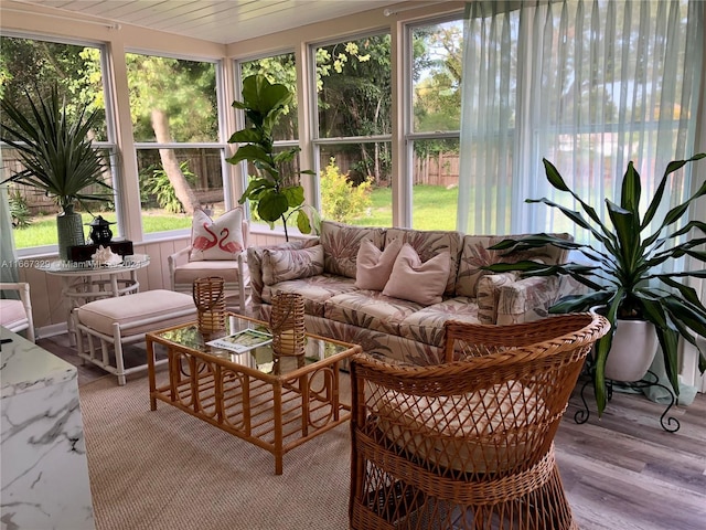 sunroom featuring wood ceiling