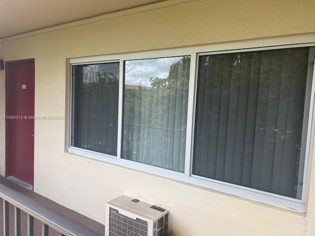exterior details featuring stucco siding