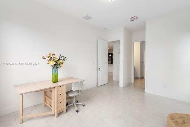 office space featuring light tile patterned floors