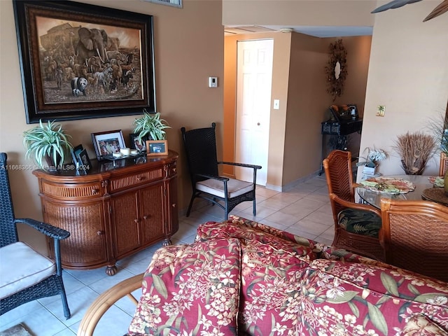 living room with light tile patterned floors