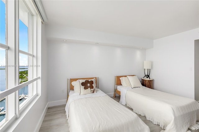 bedroom with light hardwood / wood-style floors