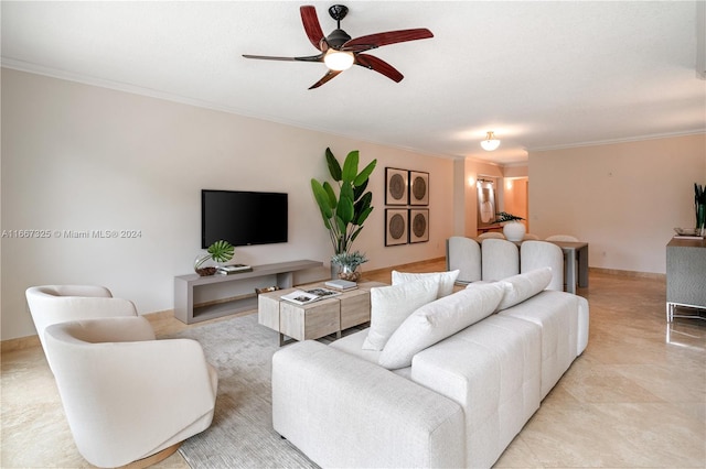 living room featuring ornamental molding and ceiling fan