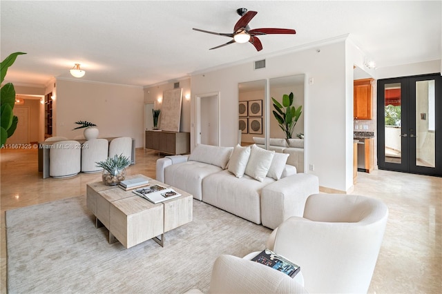 living room featuring ceiling fan, french doors, and crown molding