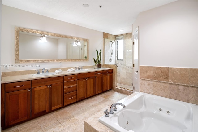 bathroom featuring vanity, shower with separate bathtub, and tile patterned flooring