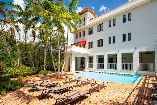 view of swimming pool featuring a patio area