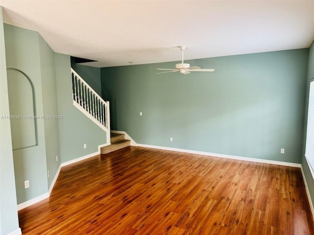 unfurnished room featuring wood-type flooring and ceiling fan