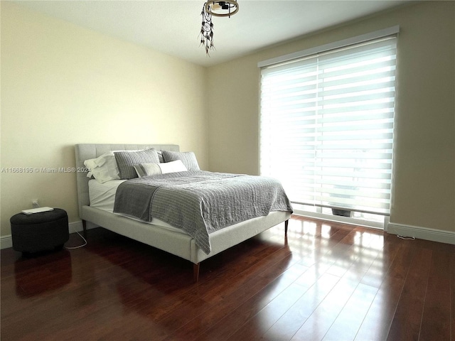 7275 SW 90th Way Unit 407, Miami, FL 33156 - bedroom with baseboards and wood finished floors