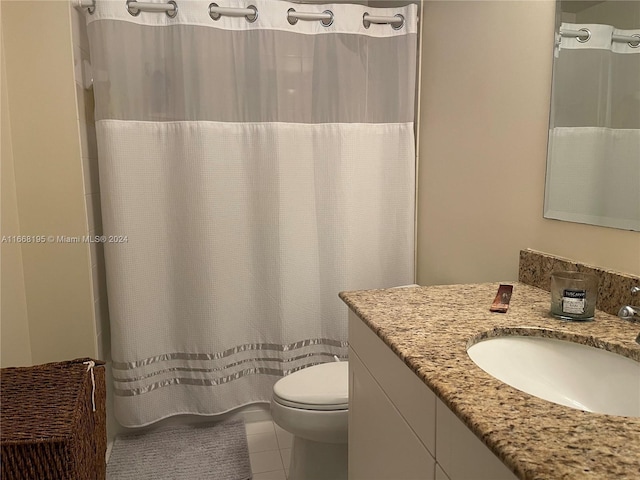 7275 SW 90th Way Unit 407, Miami, FL 33156 - bathroom featuring toilet, a shower with shower curtain, tile patterned flooring, and vanity
