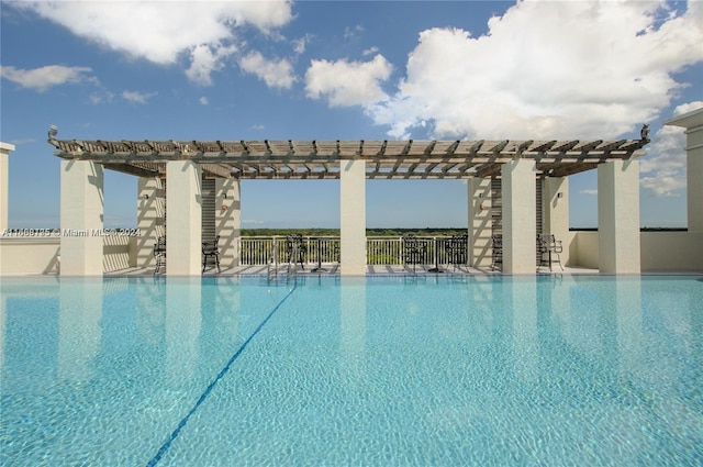 7275 SW 90th Way Unit 407, Miami, FL 33156 - community pool with a patio, a pergola, and fence