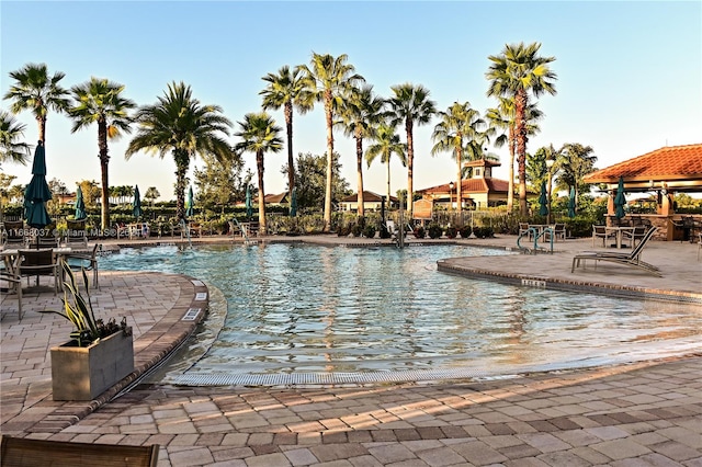 view of pool with a patio and a gazebo