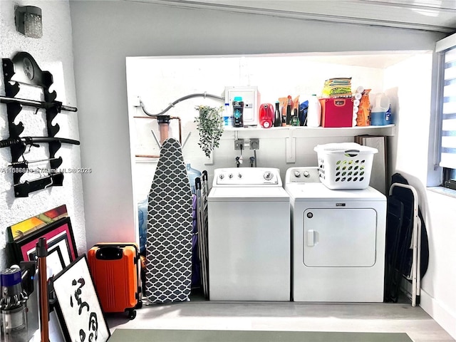 laundry room with washer and clothes dryer