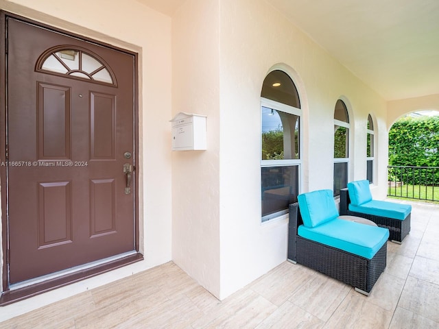 property entrance with a porch