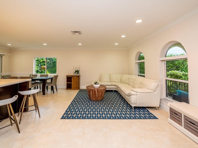 tiled living room with crown molding