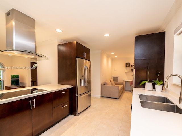 kitchen with dark brown cabinetry, extractor fan, sink, stainless steel fridge with ice dispenser, and black electric stovetop