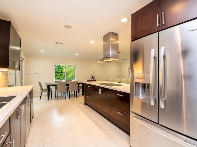 kitchen with black electric cooktop, dark brown cabinets, stainless steel fridge with ice dispenser, and island range hood