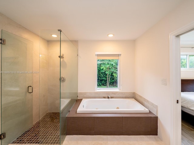 bathroom featuring plus walk in shower