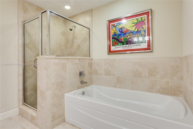 bathroom featuring independent shower and bath and tile patterned floors