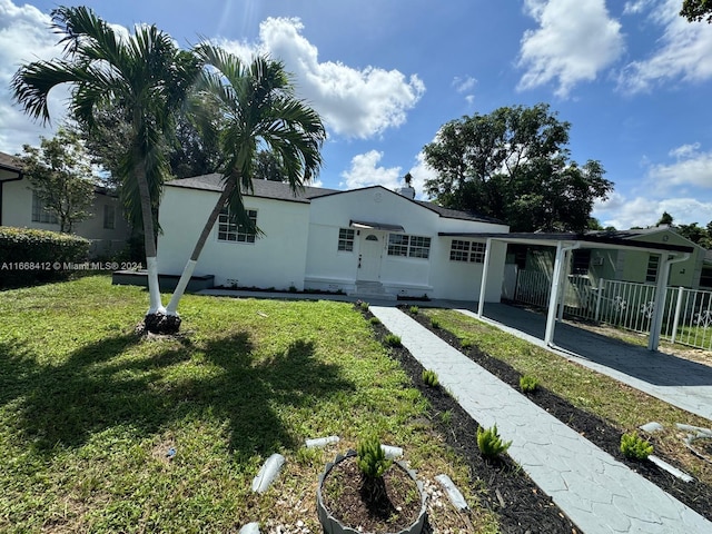 view of front of home with a front lawn