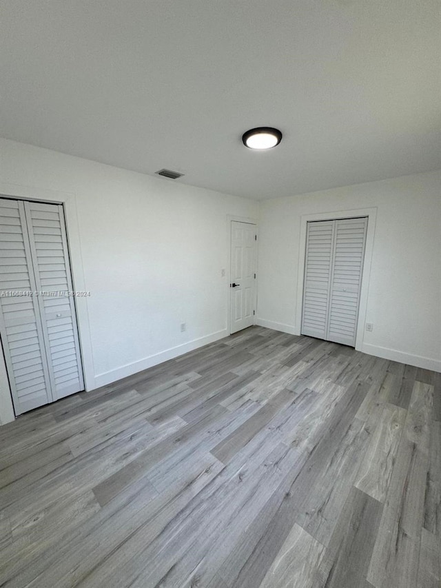 unfurnished bedroom featuring light hardwood / wood-style flooring