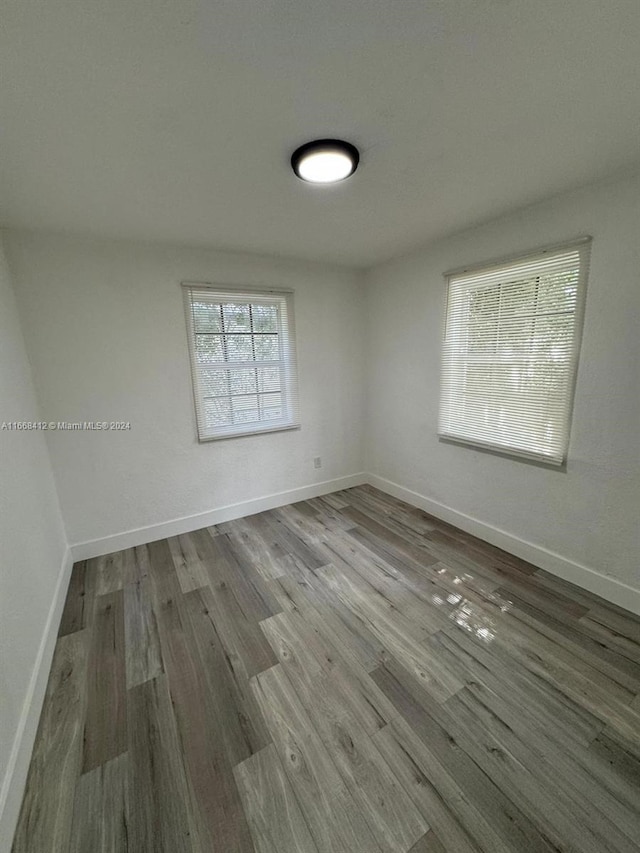 empty room featuring hardwood / wood-style floors