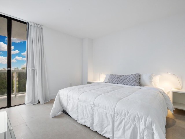 20505 E Country Club Dr Unit 531, Aventura, FL 33180 - bedroom with access to exterior and expansive windows