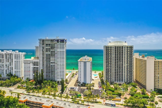 bird's eye view featuring a water view and a view of city