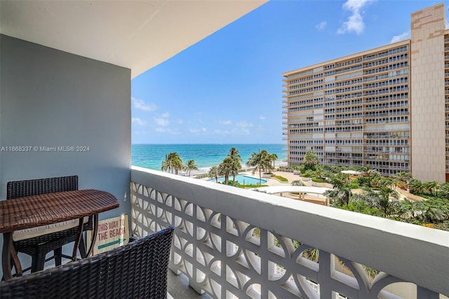 balcony featuring a water view