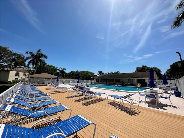 view of swimming pool with a patio