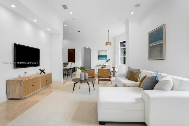 living room featuring light tile patterned floors