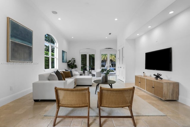 living room with french doors and plenty of natural light