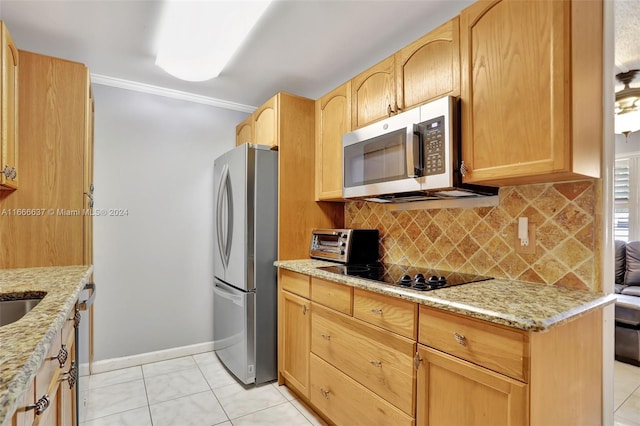 kitchen with light brown cabinetry, light stone countertops, stainless steel appliances, and crown molding