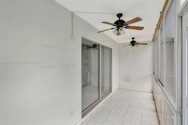 interior space featuring ceiling fan