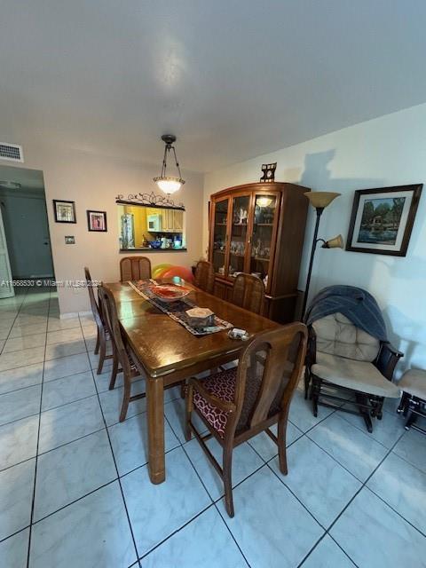 view of tiled dining room