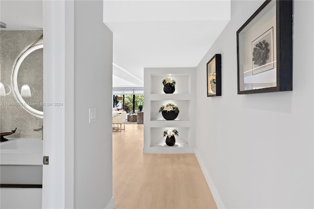 hall featuring light wood-type flooring