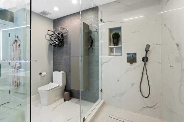 bathroom with an enclosed shower and toilet