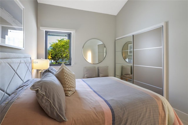 bedroom with vaulted ceiling