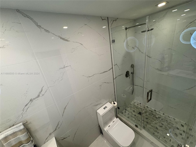 bathroom with walk in shower, tile walls, and toilet