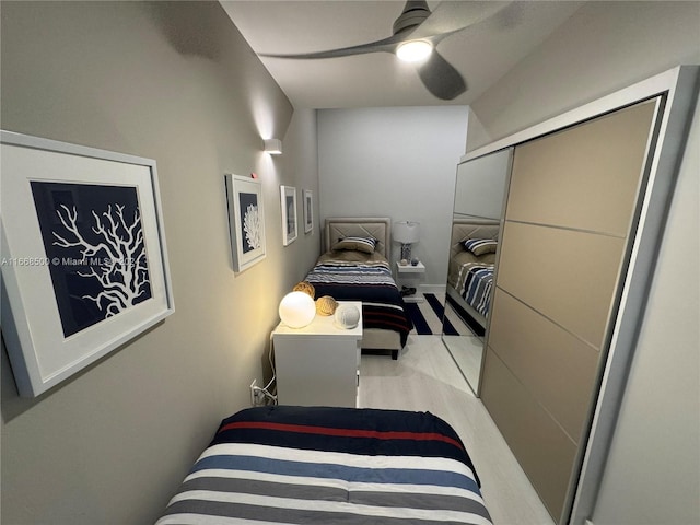 bedroom featuring a closet and ceiling fan