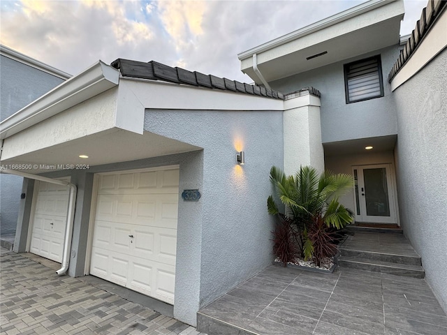 exterior space with a garage