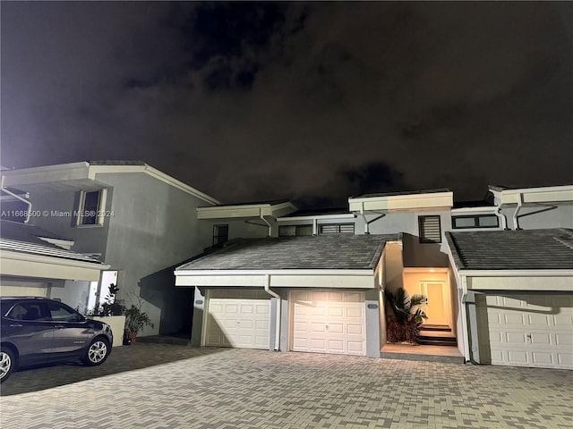 view of front of home with a garage