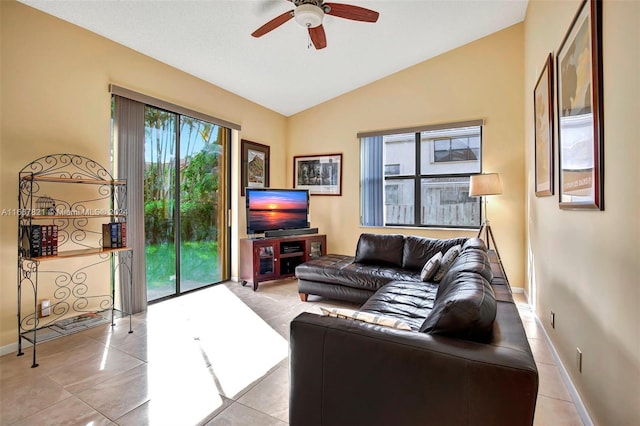 tiled living room with vaulted ceiling and ceiling fan