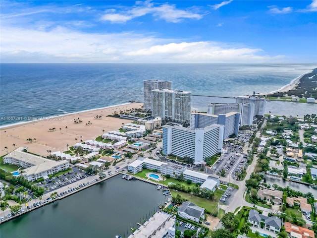 aerial view featuring a water view and a view of the beach