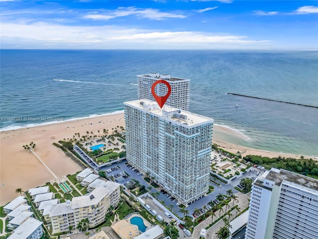 bird's eye view with a view of the beach and a water view